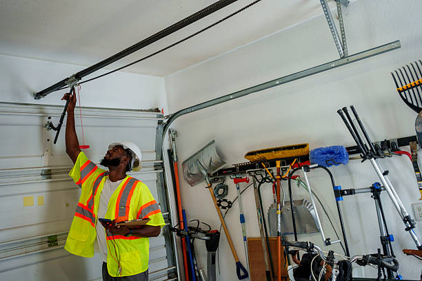 Professional Garage Door Panel Replacement technician working in Orchard Homes, MT