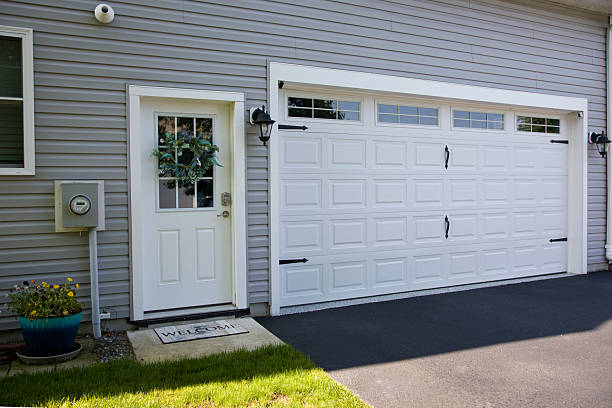 24/7 Emergency Garage Door Panel Replacement experts in Orchard Homes, MT